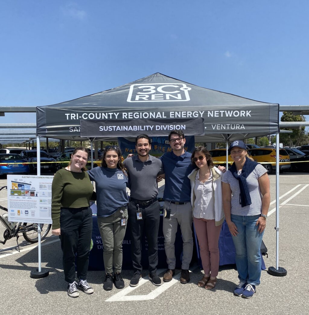 Sustainability Division staff in front of their booth for Public Works Day